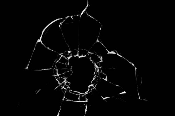 istock Concept of broken glass with hole for design on black background. 1479383614