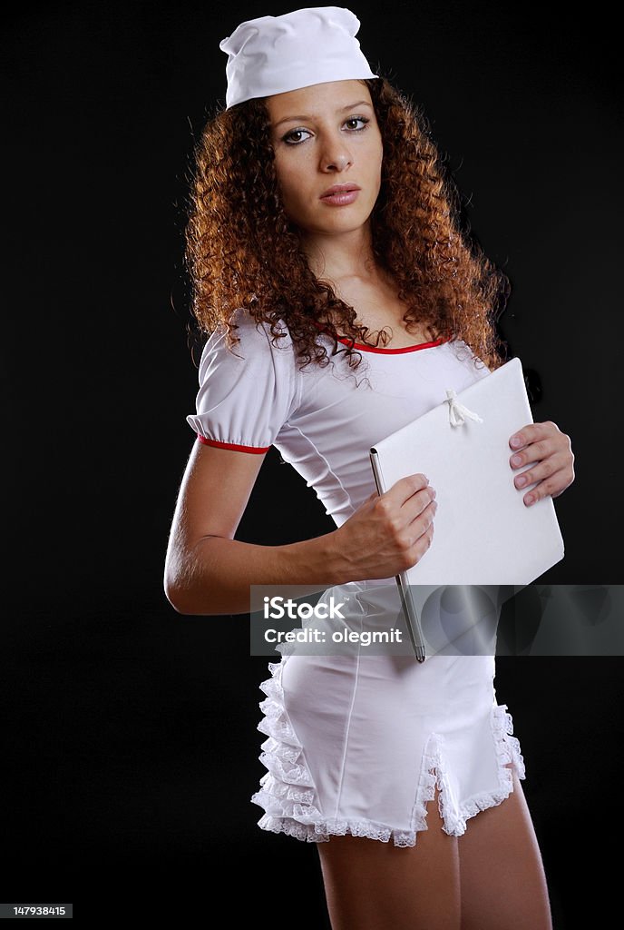 Hübsche Arzt Krankenschwester mit einem Ordner - Lizenzfrei Attraktive Frau Stock-Foto