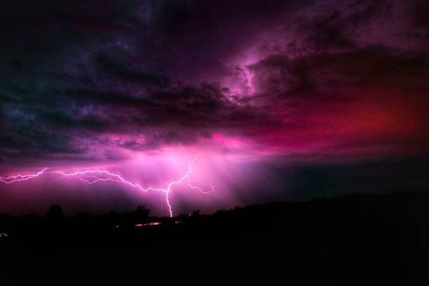 the clouds are dark and filled with a flash of lightning