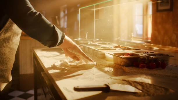 istock In Restaurant Professional Chef Preparing Pizza, Using Flour, Kneading Dough, Traditional Family Recipe. Authentic Sunny Pizzeria, Cooking Delicious Food. Cinematic Focus on Hands Shot 1479398833