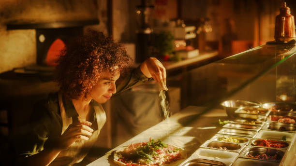 istock In Restaurant Professional Female Chef Preparing Pizza, Adding Ingredients, Special Sauce, Cheese, Traditional Family Recipe. Authentic Sunny Italian Pizzeria, Cooking Organic Food 1479399182