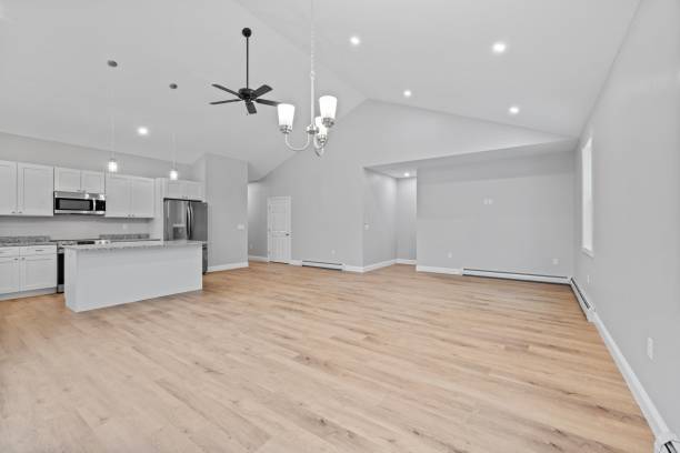 istock Room features a spacious kitchen with hardwood floors in a light gray color 1479399188