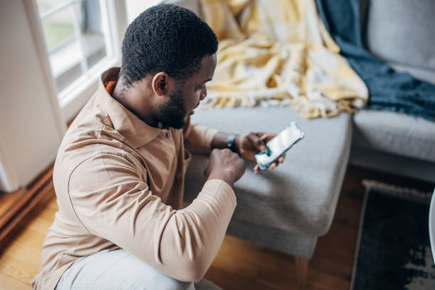 istock Man having fun gambling on phone 1479399466
