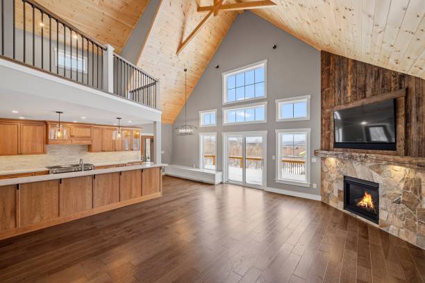 istock Interior living space featuring a wood-paneled ceiling, fireplace, and flat-screen television 1479400127