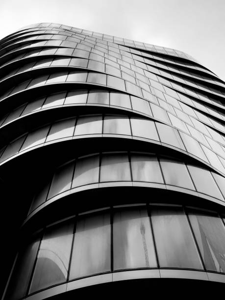 istock Grayscale shot of a modern building with wavy windows. 1479400945