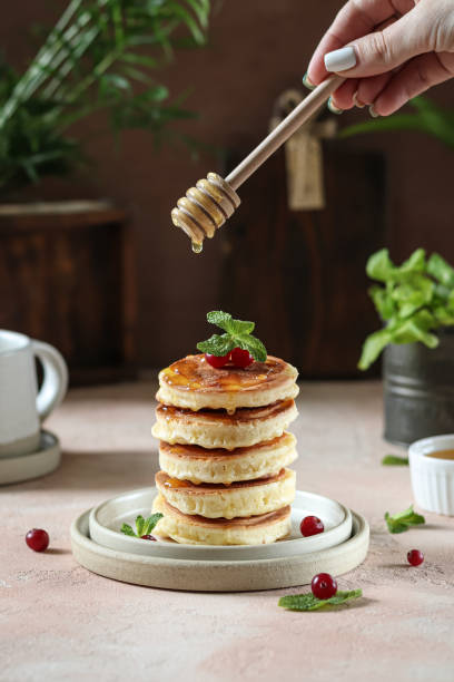 istock Homemade pancakes with honey. 1479401102