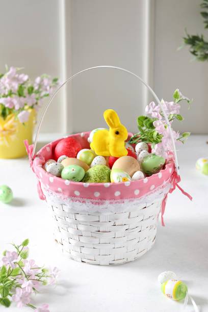 istock Easter basket with eggs and flowers. 1479409298