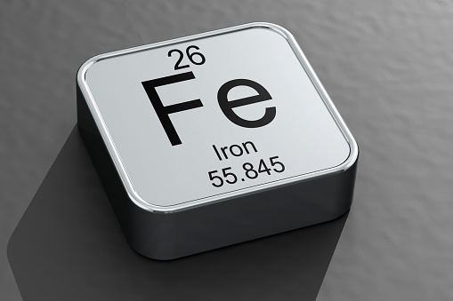 A 3D rendering of the Iron element symbol on a white metal block