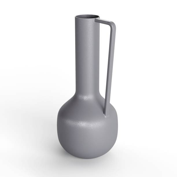istock Elegant metallic jug-shaped vase sitting atop a bright white surface 1479417934