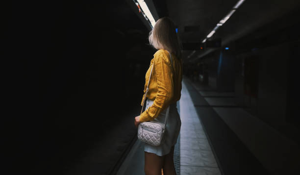 istock Woman is waiting for Subway train in the metro. 1479418568