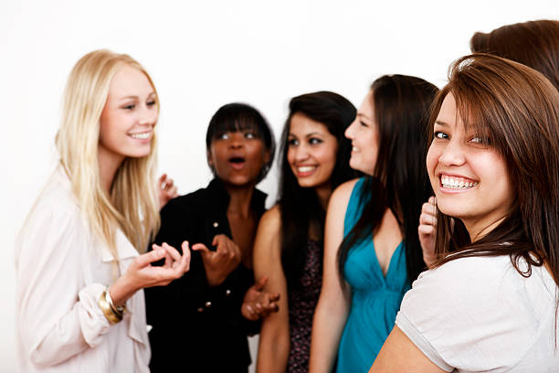 istock Group of young women smile and chat 147942032