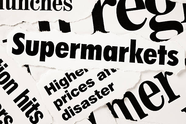istock Newspaper headlines focused on supermarkets and high prices 147942488