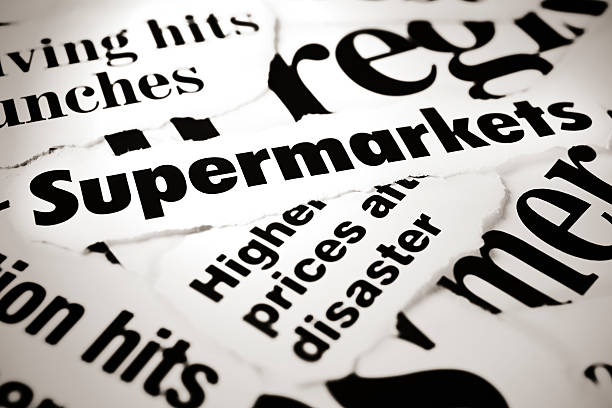 istock Newspaper headlines dealing with supermarkets & inflation 147942636