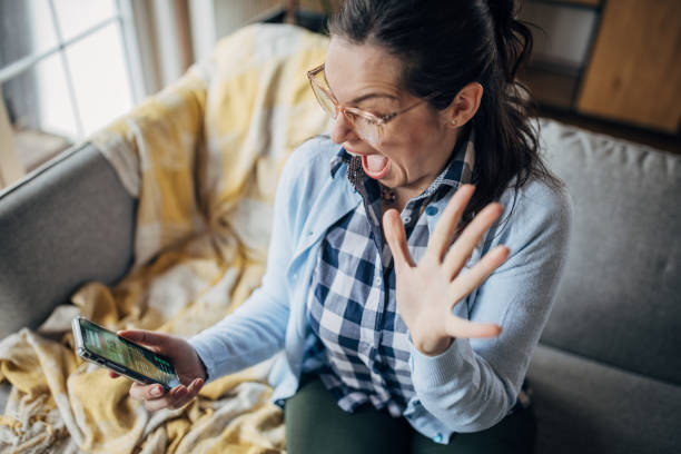 istock Woman having fun on smart phone 1479435004