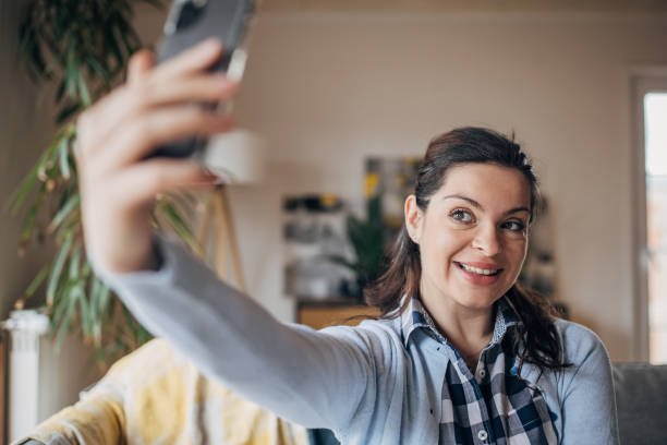 istock Woman taking a selfie 1479436872