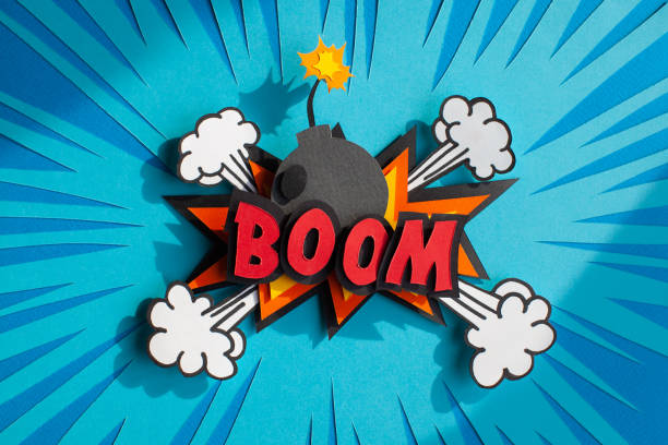 Handmade colorful paper cutting bomb. Pop art and comic style. On blue background. With word boom.