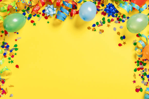 istock Decoration party on a colorful yellow background with copy space top view 1479438088
