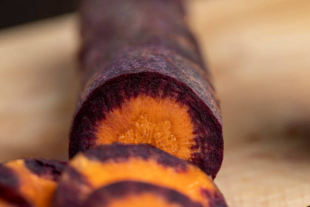 Sliced purple-orange carrots on the table