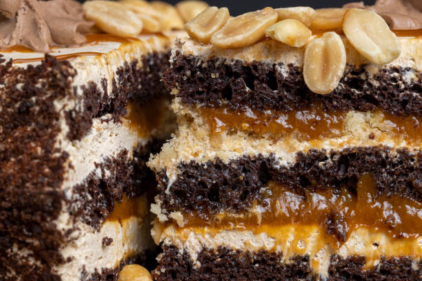 istock a piece of chocolate cake with caramel and peanuts 1479439145