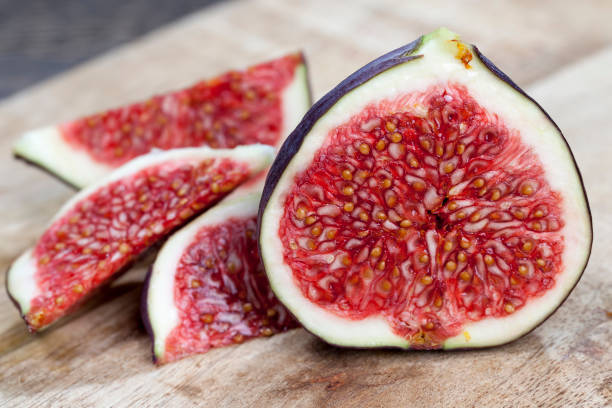 istock sliced ripe fresh purple figs, close up 1479439180