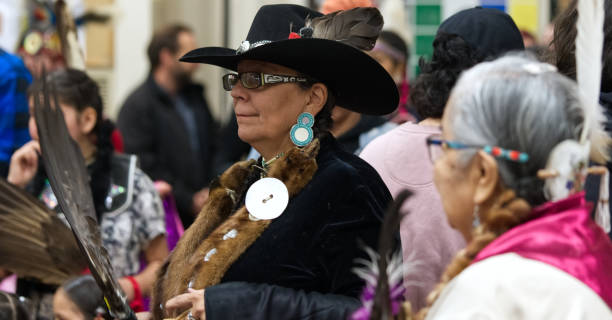 First Nations' Powwow at Earl Marriott Secondary School, White Rock, British Columbia — March 31 to April 2, 2023. Respected "elders" in their regalia stock photo