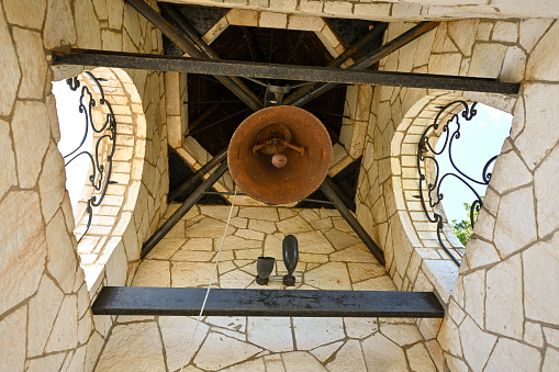The inside of a chapel bell tower