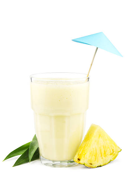 batido de piña - drink umbrella cocktail glass isolated fotografías e imágenes de stock