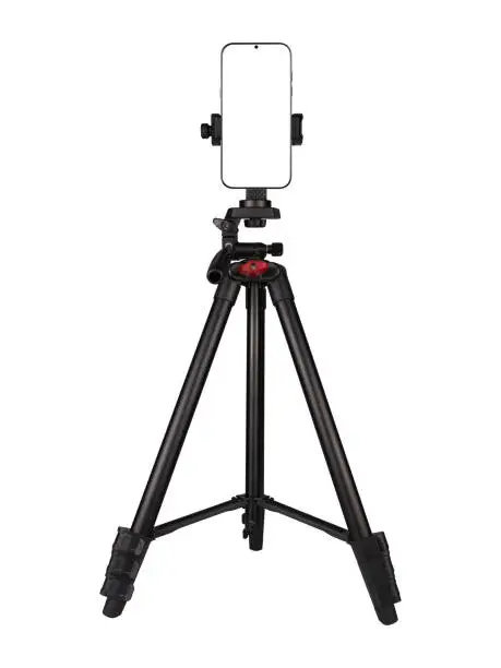 Photo of Smartphone with blank screen on the tripod camera isolated on white background.