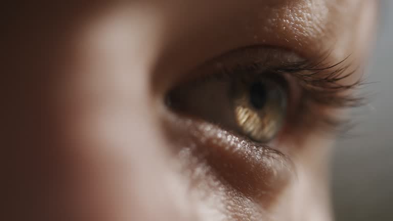 SLO MO Close up of young girl's brown eye