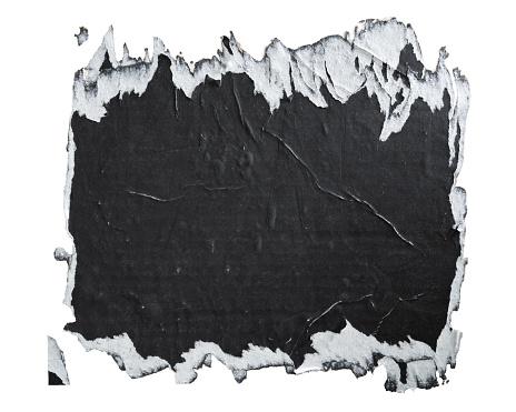 Torn black paper poster isolated on white background with clipping path