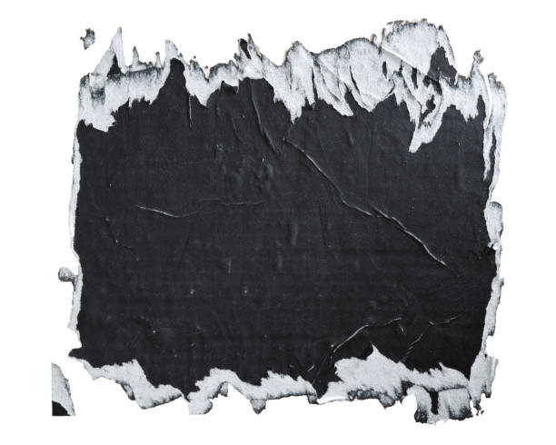 Torn black paper poster Torn black paper poster isolated on white background with clipping path wild posting ad stock pictures, royalty-free photos & images