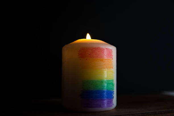 istock Candle light with rainbow colours. LGTBI flag. Concept. 1479453431