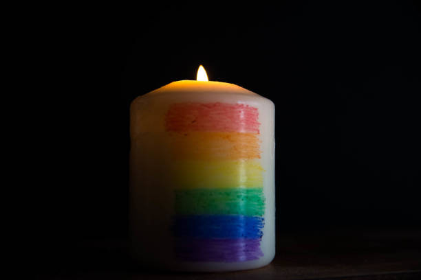 istock Candle light with rainbow colours. LGTBI flag. Concept. 1479453432