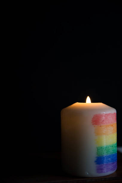 istock Candle light with rainbow colours. LGTBI flag. Concept. 1479453450