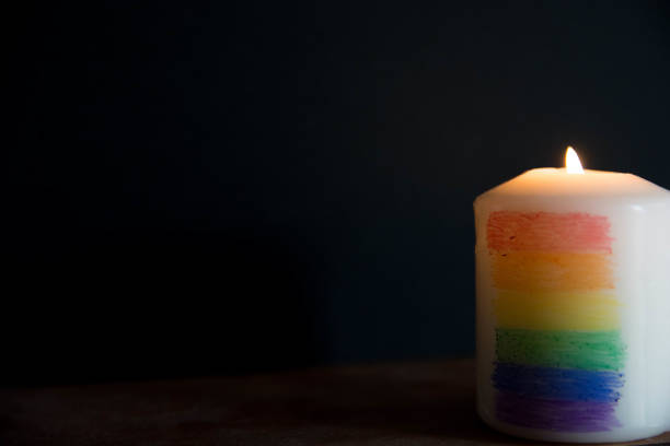 istock Candle light with rainbow colours. LGTBI flag. Concept. 1479453452