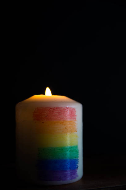 istock Candle light with rainbow colours. LGTBI flag. Concept. 1479453453