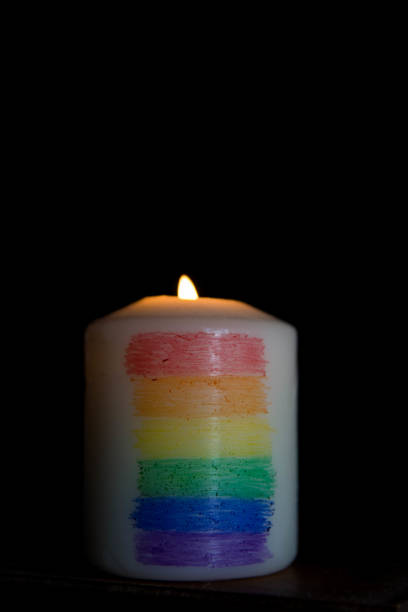 istock Candle light with rainbow colours. LGTBI flag. Concept. 1479453454