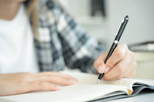 istock Student, use left-handed, inspiration, writer, writing ,creative ,recreation for imagine, writing ideas on notebook, to do list, good thinking work, journalist, Stylish, Dream image, relax, designer 1479453609