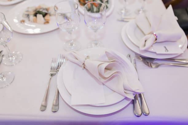 istock a plate, knife and fork on a festive table in a restaurant at a wedding 1479453811