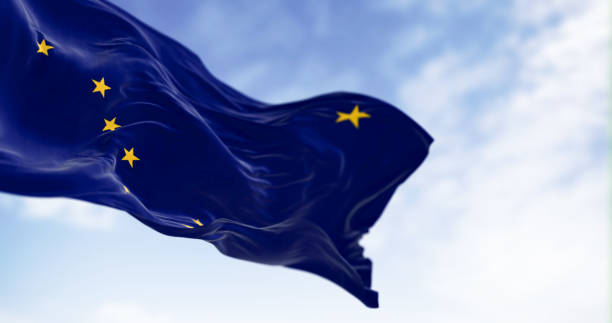 Alaska state flag waving in the wind on a clear day
