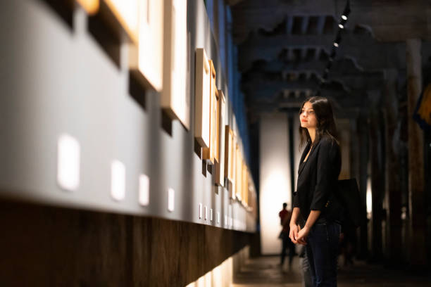 istock Young woman in art gallery 1479455449