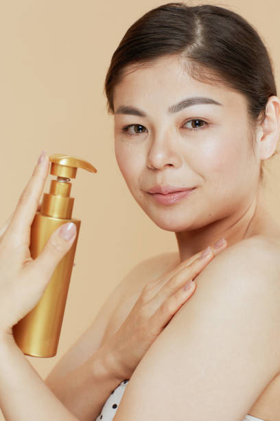 istock modern woman with contour cream on beige background 1479455833