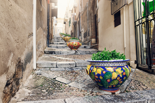 Spring, off-season day in Italy, Sicily.
Beautiful narrow street in Italian town Cefalu.
Canon R5