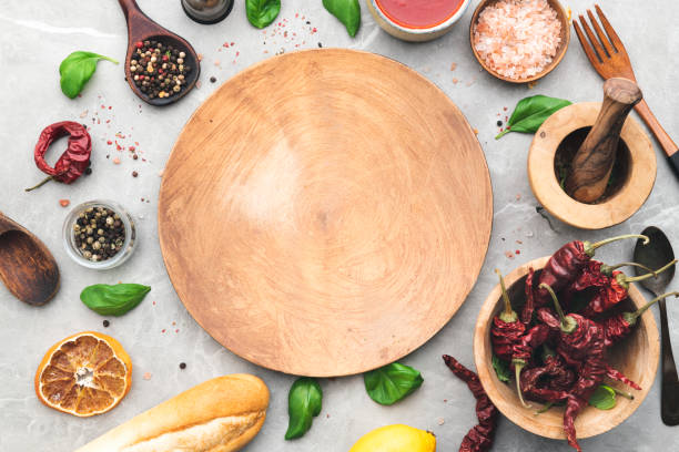 istock Modern wooden dinnerware panorama with cutlery and various dishes, overhead shot 1479458586