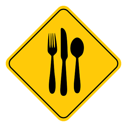 Vector illustration of a black and gold colored silverware road sign.