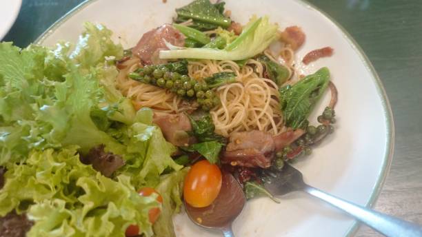 istock Thai style spaghetti spicy with bacon 1479460299