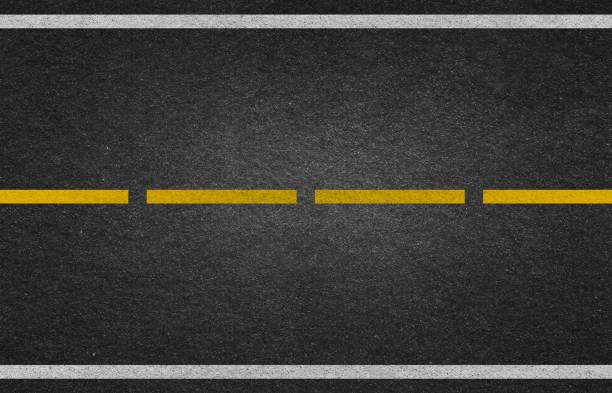 marquage au trait sur la texture de la route photo d’arrière-plan - safety yellow road striped photos et images de collection