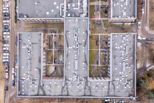 istock Drone photography of apartment block complex during spring morning 1479465828