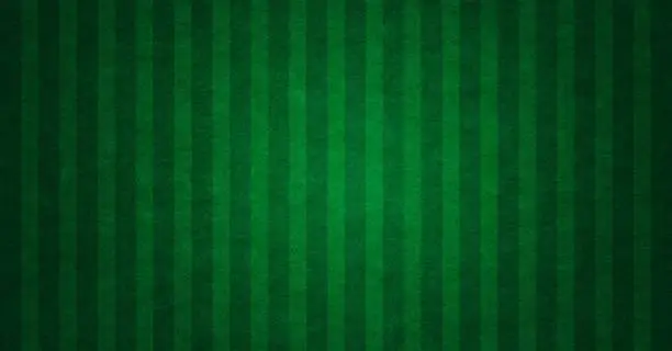 Soccerball field green grass background. Flat lay. Grass texture with stripe background stock photo