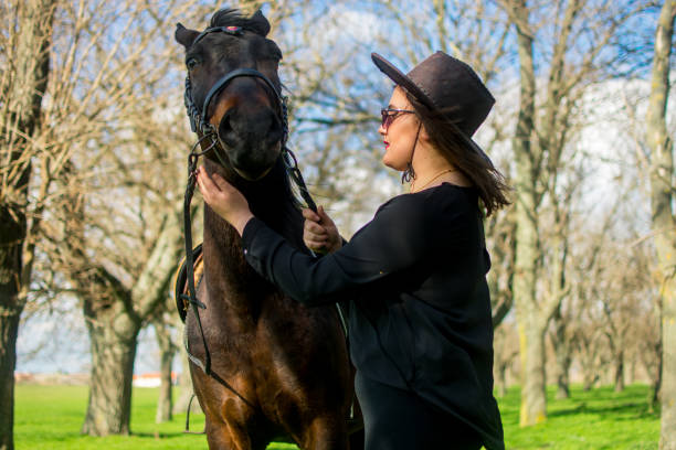 istock Woman and horse 1479467091